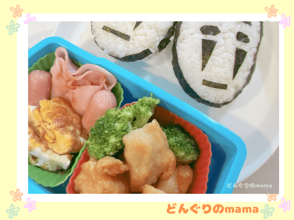 小学生の遠足用のお弁当とキャラおにぎりのイメージ写真